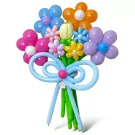 A balloon bouquet with flowers in pink, blue, orange, yellow, and purple, tied with a light blue bow.