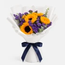 Sunflower and purple statice flower bouquet with a navy ribbon.