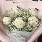 Hello Kitty flower bouquet with five white chrysanthemum Hello Kitty faces, adorned with pink bows, nestled in baby's breath.