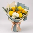 Yellow sunflowers, white roses, ping pong mums, eucalyptus, and limonium tied with a cream ribbon.