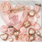Pink heart-shaped chocolate gift box with gold "P CHANG" and "Happy Birthday" decorations, surrounded by macarons and chocolate-covered strawberries.