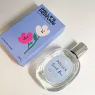 Polly's Perfume Sweet Bae bottle and box with floral design on a white background.