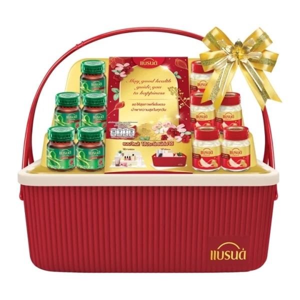 Red basket with gold ribbon holding Brand and Scott's Chicken Essence bottles and gift card.