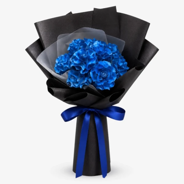 Bouquet of vibrant blue dried roses wrapped in black and white paper, tied with a blue ribbon.