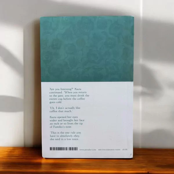 Back cover of "Before the Coffee Gets Cold" book with text and teal patterned top.