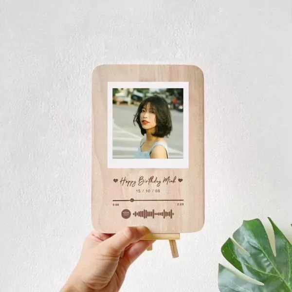 Wooden frame with photo and Spotify music code for "Happy Birthday Minh".