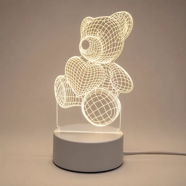 3D line art teddy bear lamp holding a heart and ball on a wooden surface.
