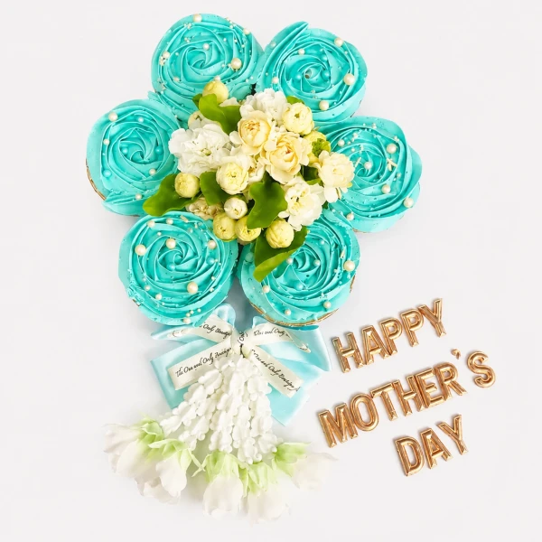 Blue cupcakes arranged as a flower with jasmine, gift ribbon, and "Happy Mother's Day" text.
