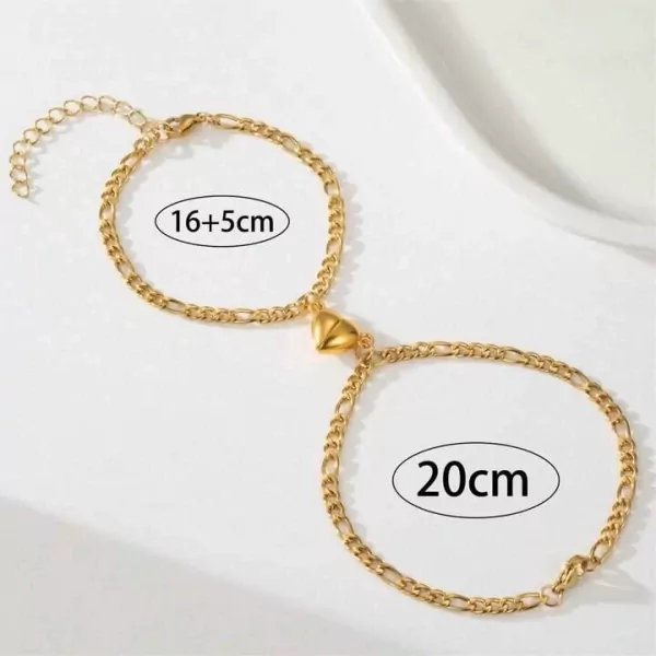 Two gold chain bracelets with magnetic half-heart charms, labeled "16+5cm" and "20cm".