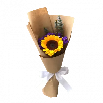Sunflower and purple statice bouquet in brown paper with a white ribbon.