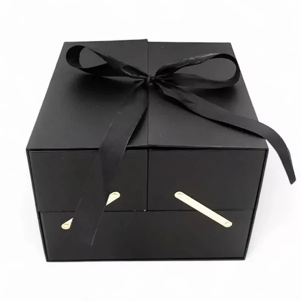 Black luxury box with black ribbon bow and gold handles, showcasing I Love You Fresh Roses.
