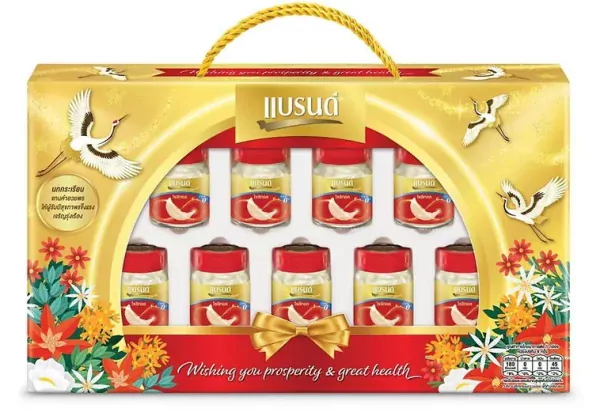 Gold gift box of Scotch Chicken Essence with 9 bottles, cranes, and flowers.