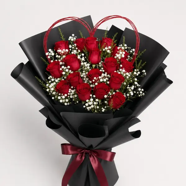 18 fresh red roses, fresh white baby's breath fillers, a handmade heart-shaped twig frame