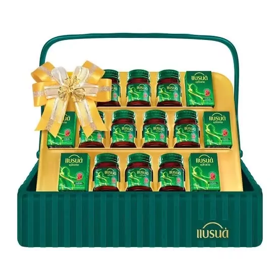 Green basket with a gold ribbon, filled with bottles and boxes of a health product.