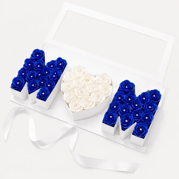 Blue and white roses spelling "MOM" in a white box with a ribbon.