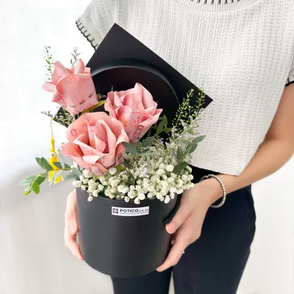 Graduation money box with pink money roses and white mums.
