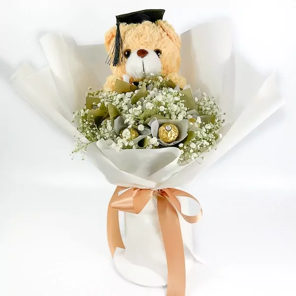 Graduation teddy bear bouquet with Ferrero Rocher chocolates and white gypsophila.
