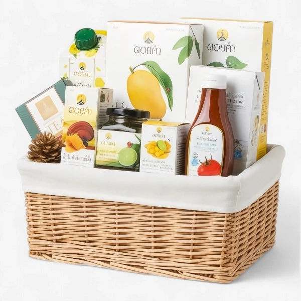 Doi Kham hamper basket with assorted food and drink products, including mango, lime, and tea.