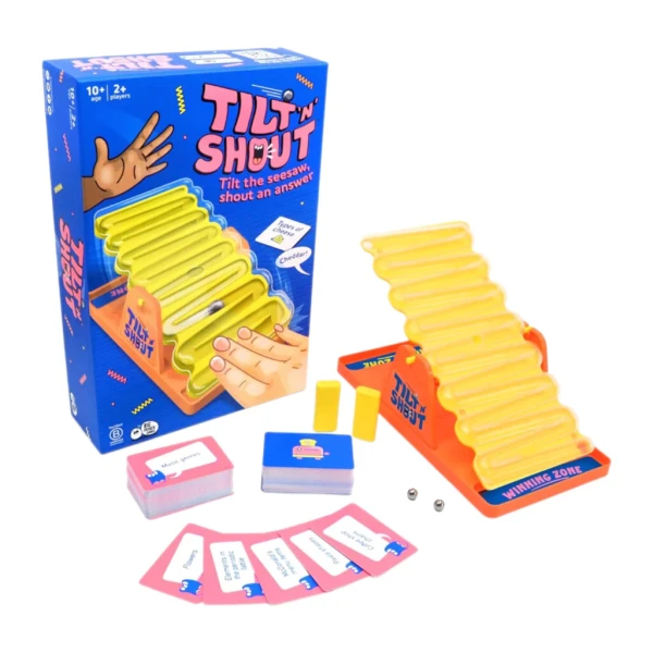 Tilt 'n' Shout game box and components, including a yellow seesaw game piece and cards.