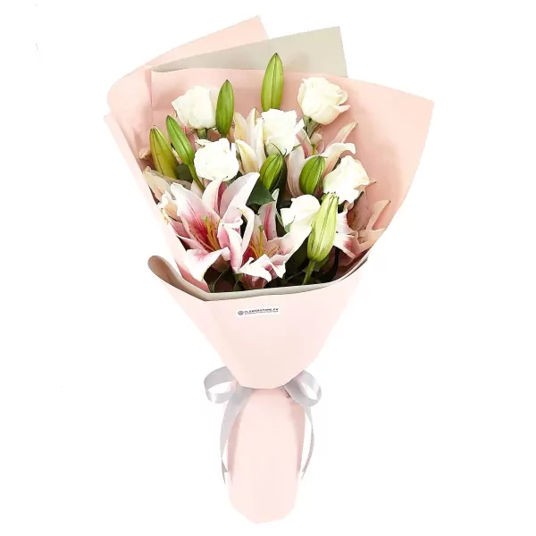 Bouquet of pink stargazer lilies and white roses in pink paper with a grey ribbon.