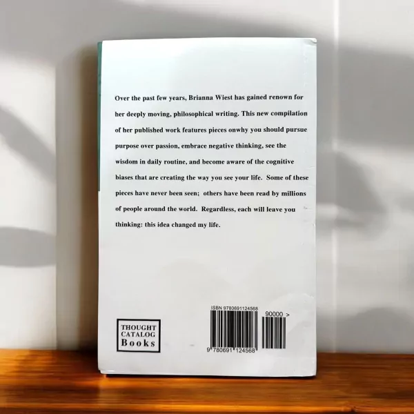 Back cover of "101 Essays That Will Change The Way You Think Book" with text and ISBN.
