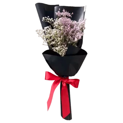 Bouquet of white and pink dried limonium flowers in black wrapper, tied with a red ribbon.