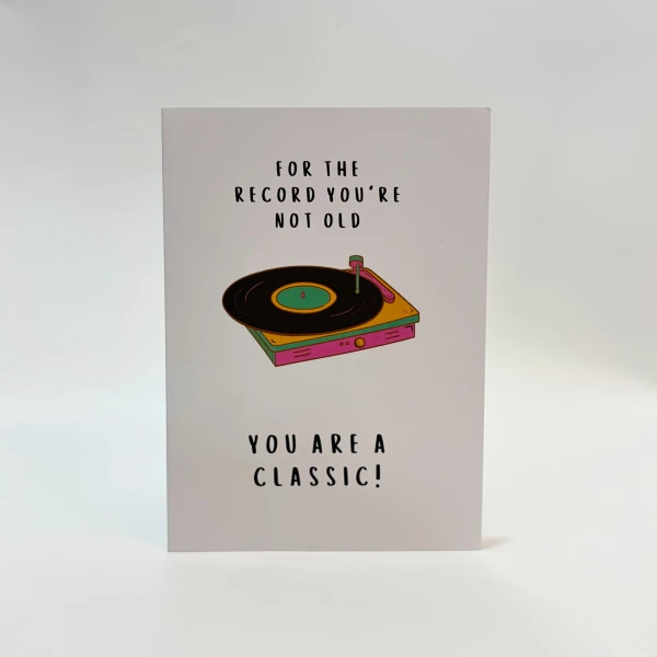 Card with a retro record player illustration and text that says "For the record you're not old, you are a classic!"