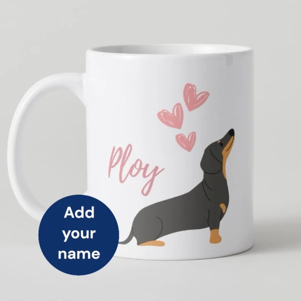White mug with dachshund illustration, pink hearts, and text "Ploy".