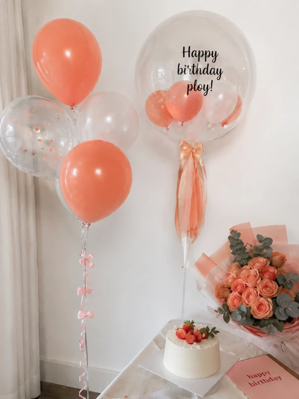 Peach bubble balloon with "Will You Marry Me?" text and a bouquet of peach and white balloons.