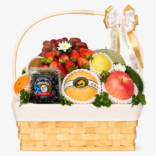 Fruit basket with strawberries, grapes, blueberries, apples, pears, and a melon.