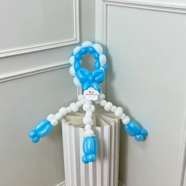 A balloon sculpture of a person in blue and white balloons.