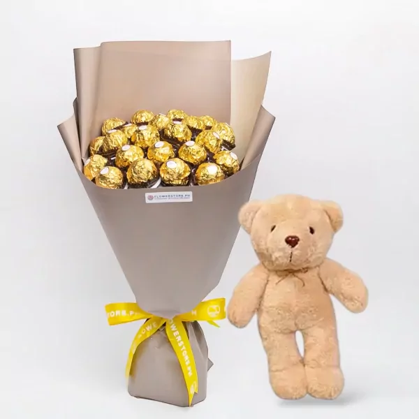 Ferrero Rocher bouquet and a teddy bear with a white background.