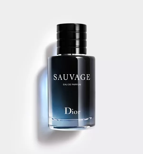 Dior Sauvage Eau de Parfum bottle, black cap, blue-toned glass with "SAUVAGE EAU DE PARFUM Dior" text.