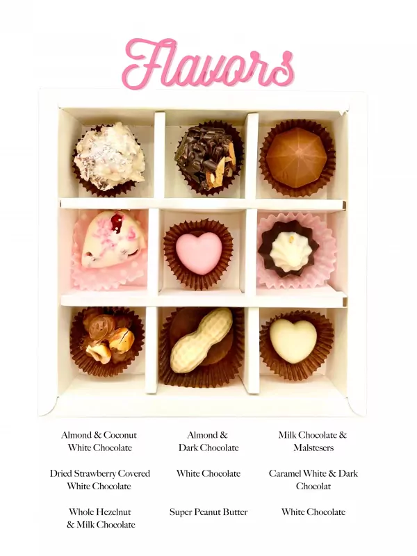 Box of 9 assorted chocolates with flavor labels: Almond & Coconut, Almond & Dark, Milk Chocolate & Maltesers, Dried Strawberry, White Chocolate, Caramel White & Dark, Whole Hazelnut, Super Peanut Butter, Heart-shaped white chocolate.