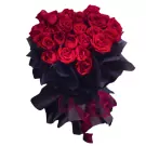 Bouquet of 30 red Ecuador roses in black wrapping with red ribbon.