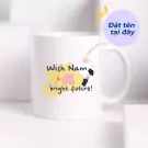White ceramic mug with graduation-themed design and "Đặt tên tại đây" text.
