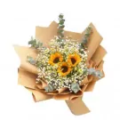 Winnie bouquet: Three sunflowers surrounded by baby's breath and eucalyptus, wrapped in brown paper.