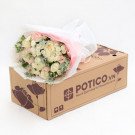 Bouquet of pink and white roses and carnations on a POTICO.VN flower delivery box.