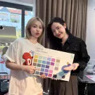 Two women hold a color palette, with "True Summer" and "Color Palette" printed on it.