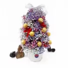 Tree-shaped floral arrangement with baby's breath, Ferrero Rocher chocolates, and red bows in a pot.