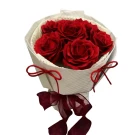 Bouquet of 6 red soap roses wrapped in white paper with red ribbon bow.