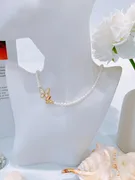 Pearl necklace with butterfly charm 1