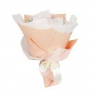 Peach and white wrapped bouquet with a cream ribbon, featuring strawberries and baby's breath.