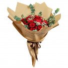 Red roses, baby's breath, and eucalyptus in brown paper wrap with "Gorgeous You" text.