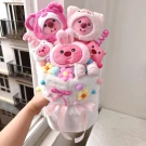 Pink Loopy character stuffed animal bouquet with flowers and bows.