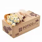 White roses in a bouquet on a brown box with a logo.