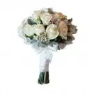 Bridal bouquet of white roses with silver-dusted foliage and a white satin ribbon.