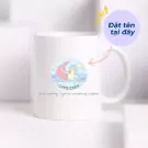 White ceramic mug with Capricorn zodiac design and personalized text.