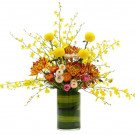 Golden Aurora floral arrangement with yellow orchids, orange and yellow chrysanthemums in a green striped vase.
