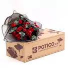 Bouquet of 18 red roses wrapped in black mesh on a cardboard box.